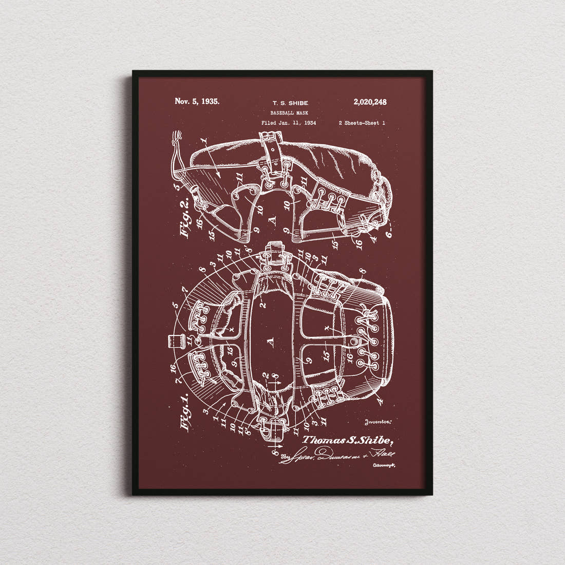 Baseball Mask Patent Print in the burgundy colourway, framed