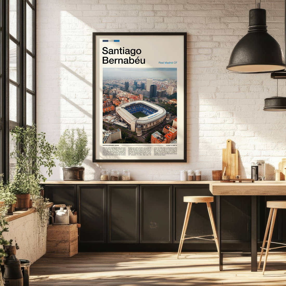 Bernabeu Stadium Print framed on the wall of a bright kitchen and dining space