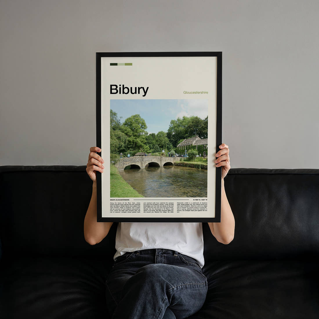 Bibury Stone Bridge Over River Travel Print held up by hand to show the size of the print