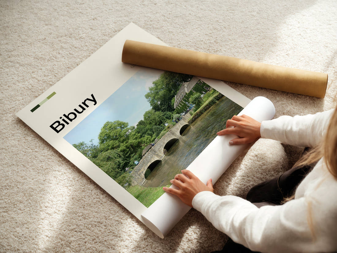 Bibury Stone Bridge Over River Travel Print being unrolled from its postal tube