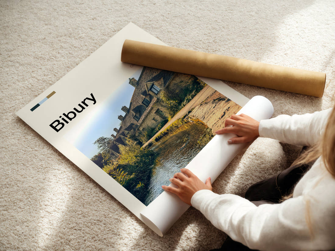 Bibury Riverside Cottage Row Travel Print being unrolled from its postal tube