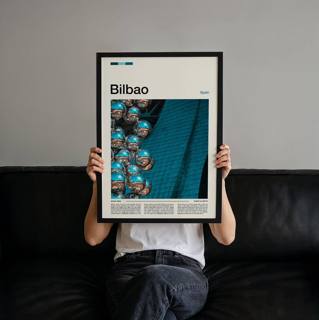 Bilbao Mirrored Sphere Sculpture Travel Print held up by hand to show the size of the print