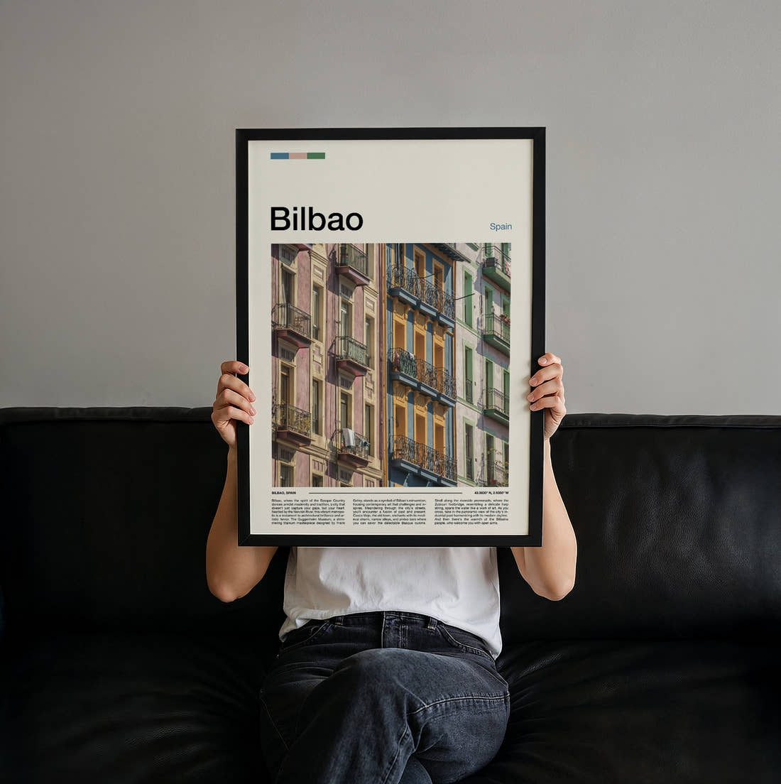 Bilbao Colourful Window Shutters Travel Print held up by hand to show the size of the print
