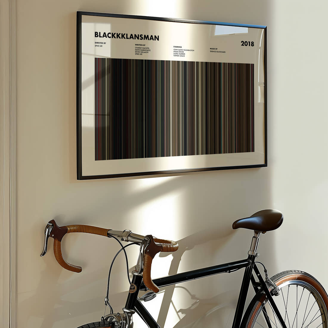 BlacKkKlansman Movie Barcode Poster framed on the wall of a styled room setting