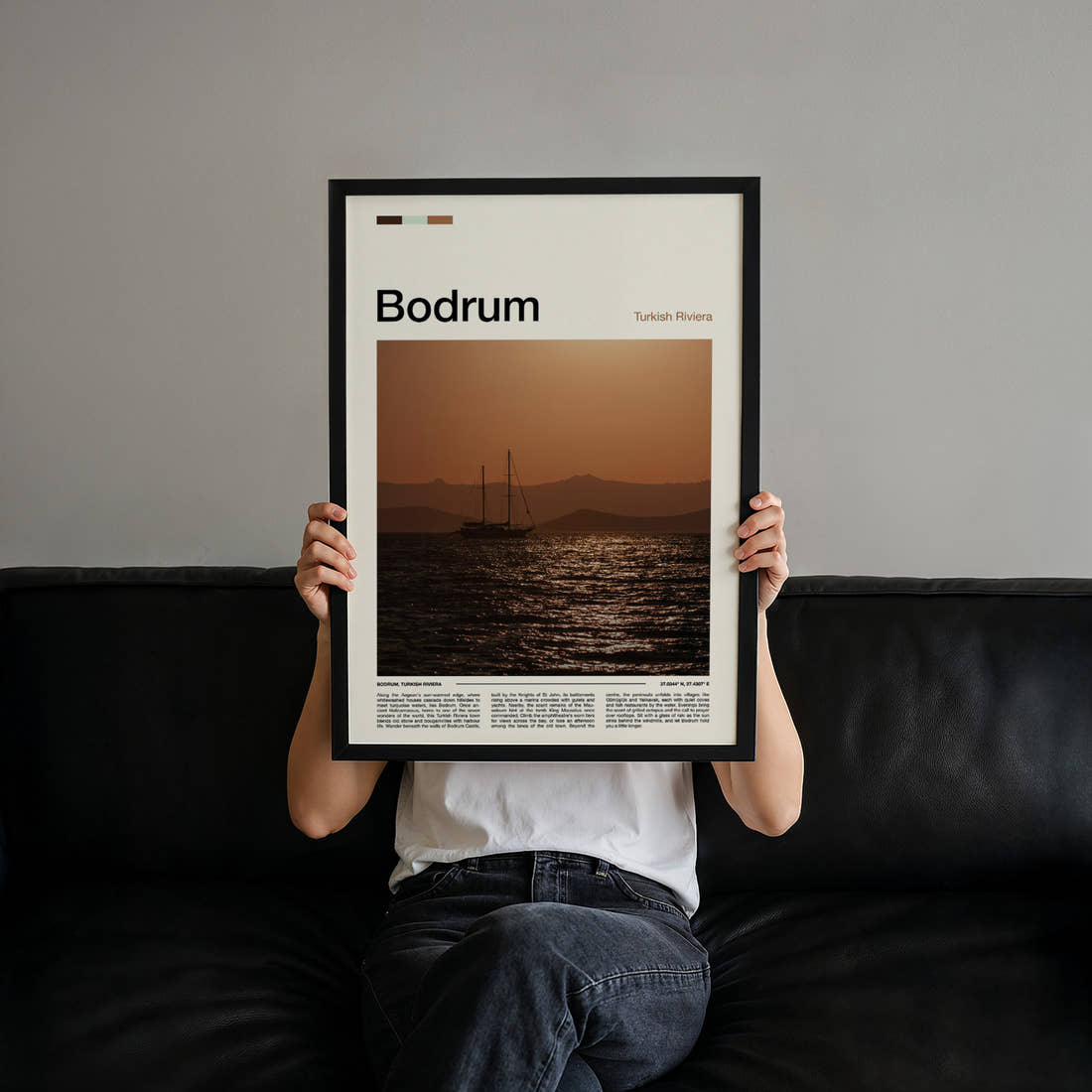Bodrum Sunset Sailing Boat Travel Print held up by hand to show the size of the print