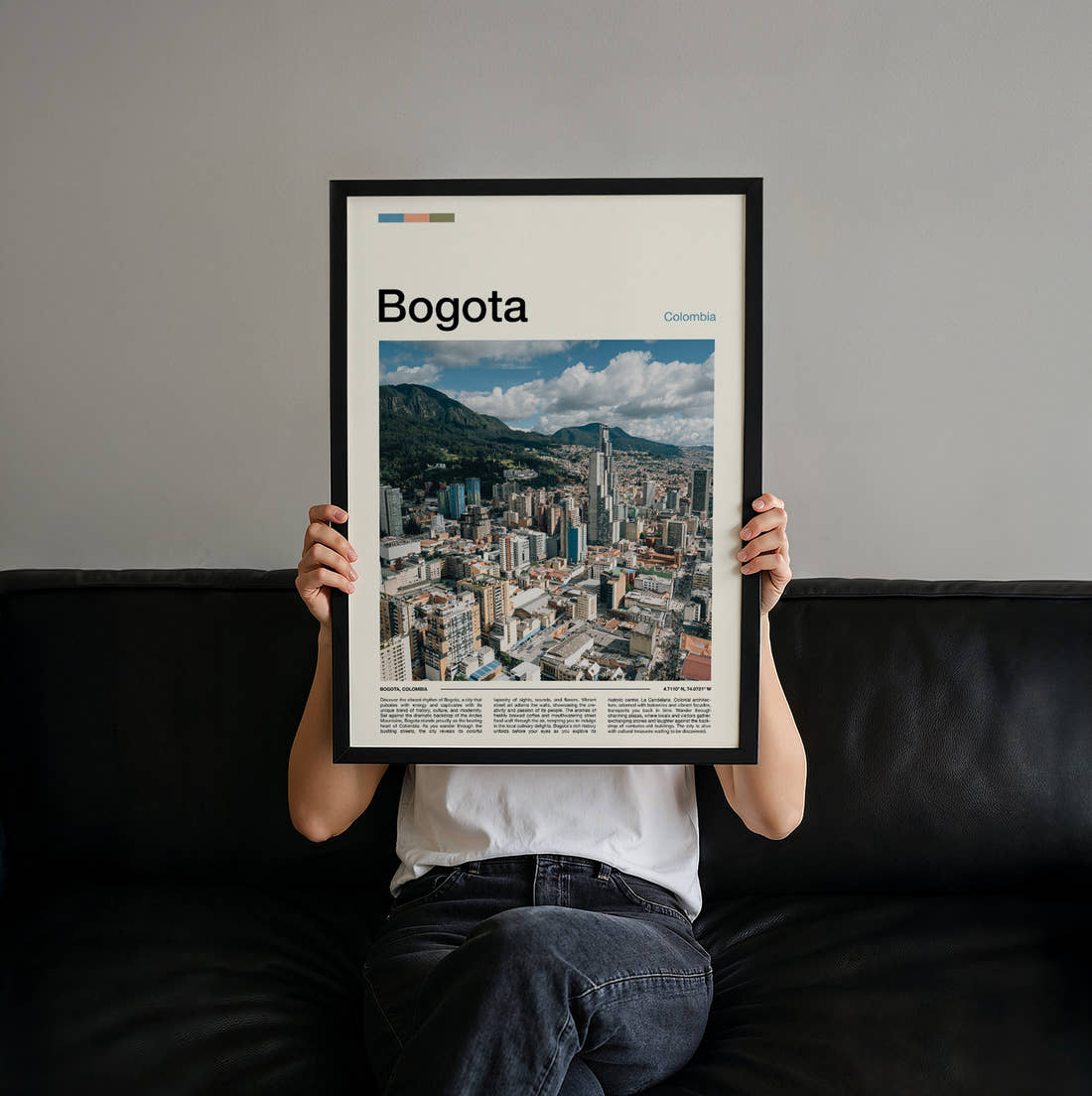 Bogota City Below The Mountains Travel Print held up by hand to show the size of the print