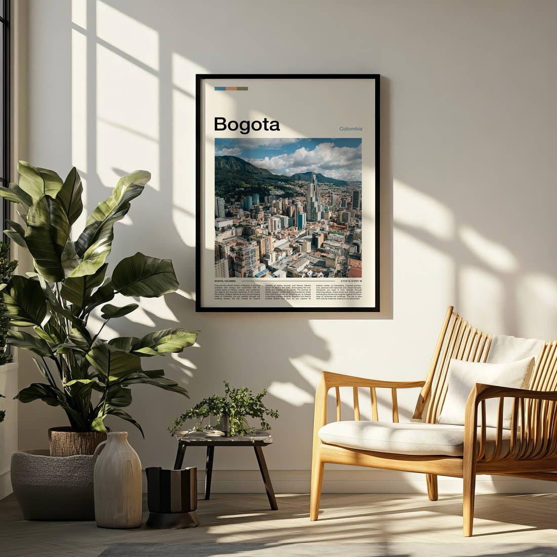 Bogota City Below The Mountains Travel Print framed on a pale wall beside houseplants