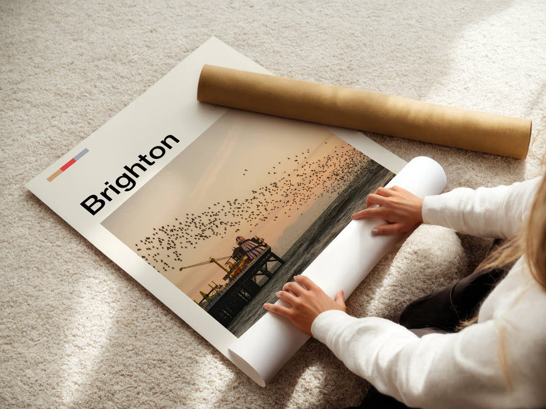 Brighton Starling Murmuration Travel Print being unrolled from its postal tube