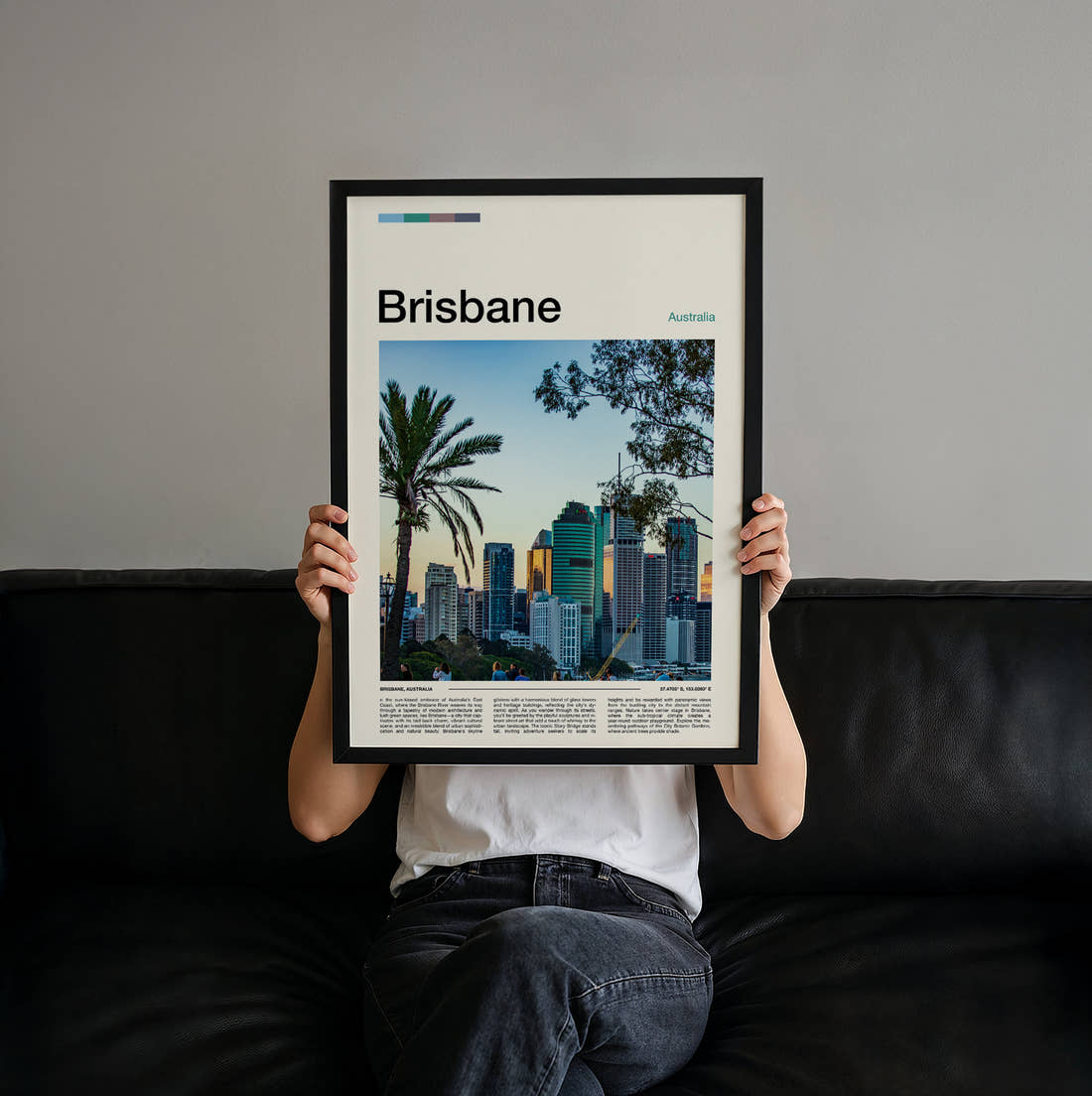 Brisbane Skyline Behind Palm Trees Travel Print held up by hand to show the size of the print
