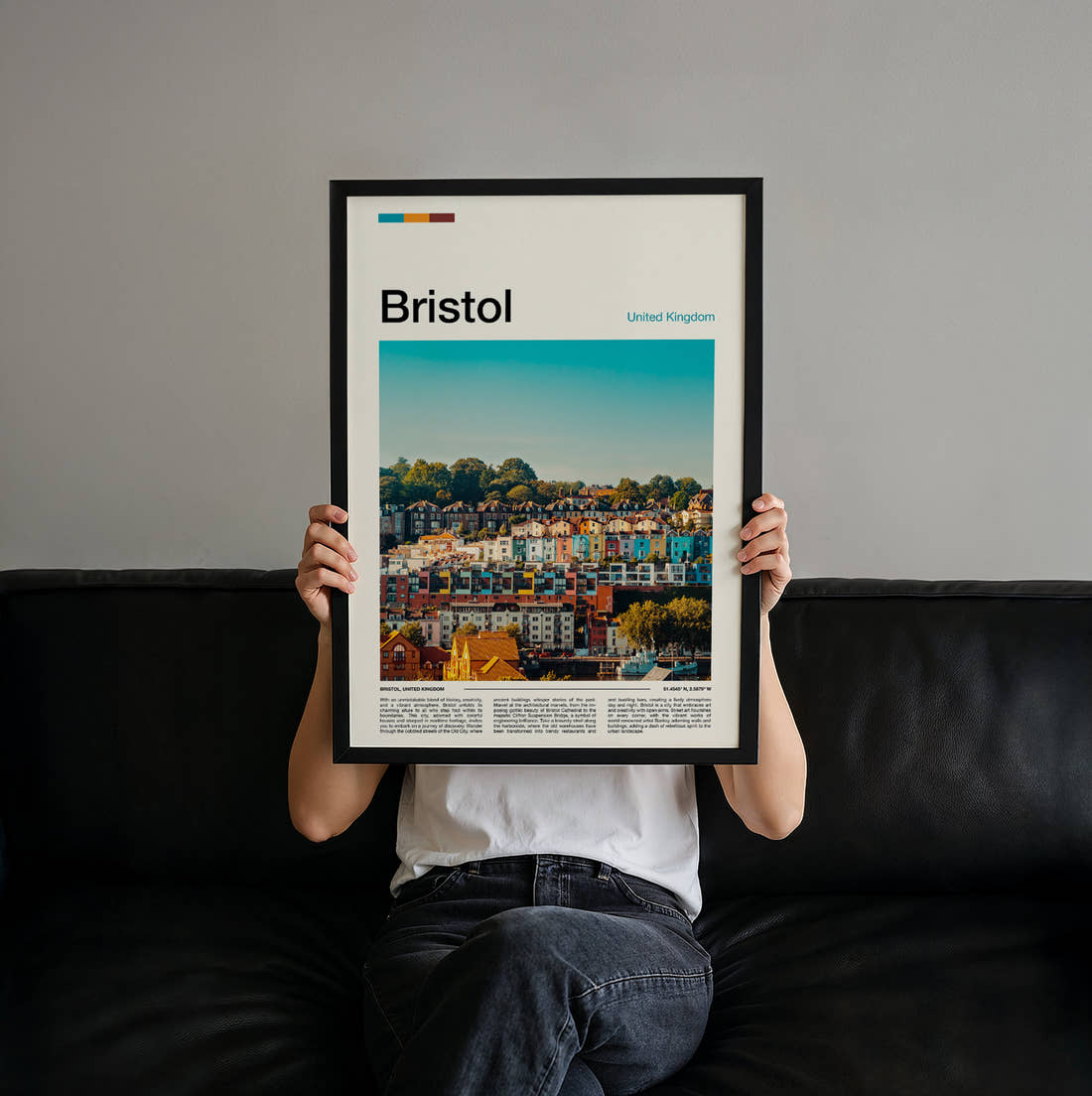 Bristol Colourful Terraced Houses Travel Print held up by hand to show the size of the print