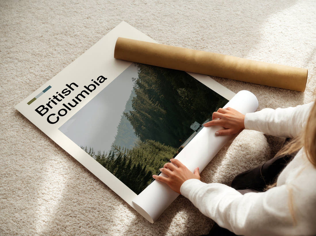 British Columbia Road Through The Forest Travel Print being unrolled from its postal tube