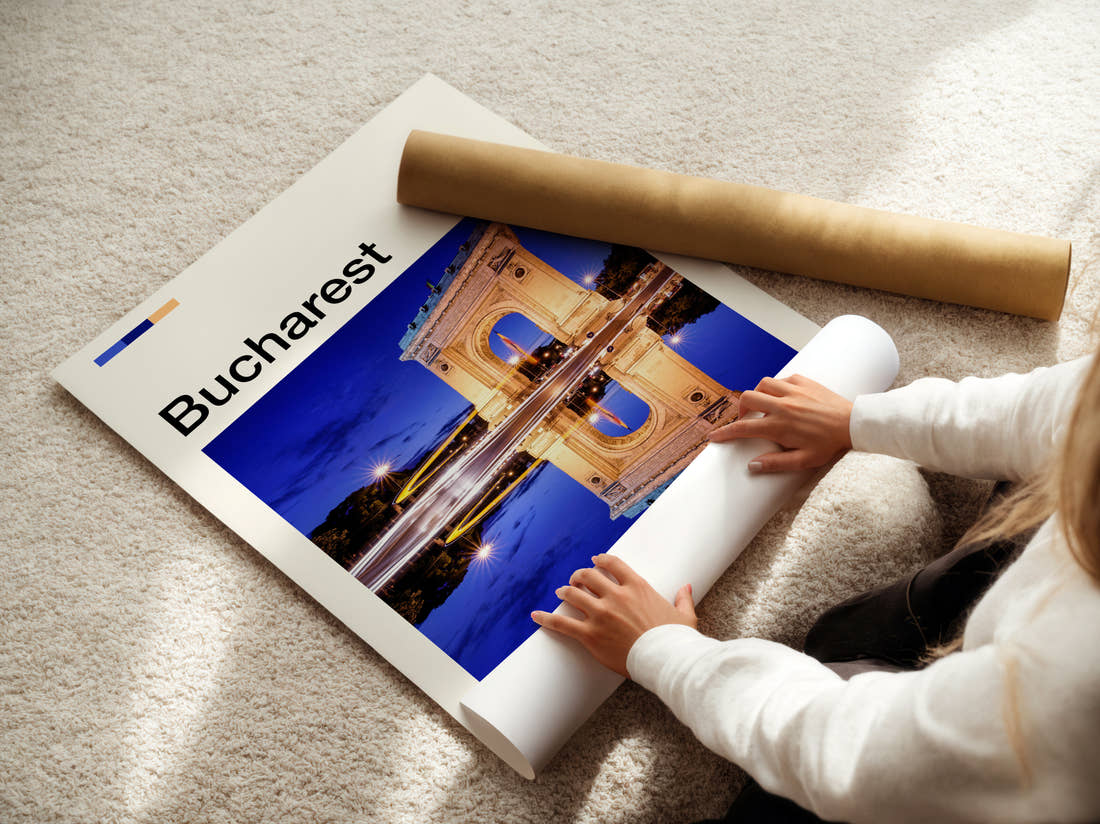 Bucharest Arch Of Triumph Travel Print being unrolled from its postal tube