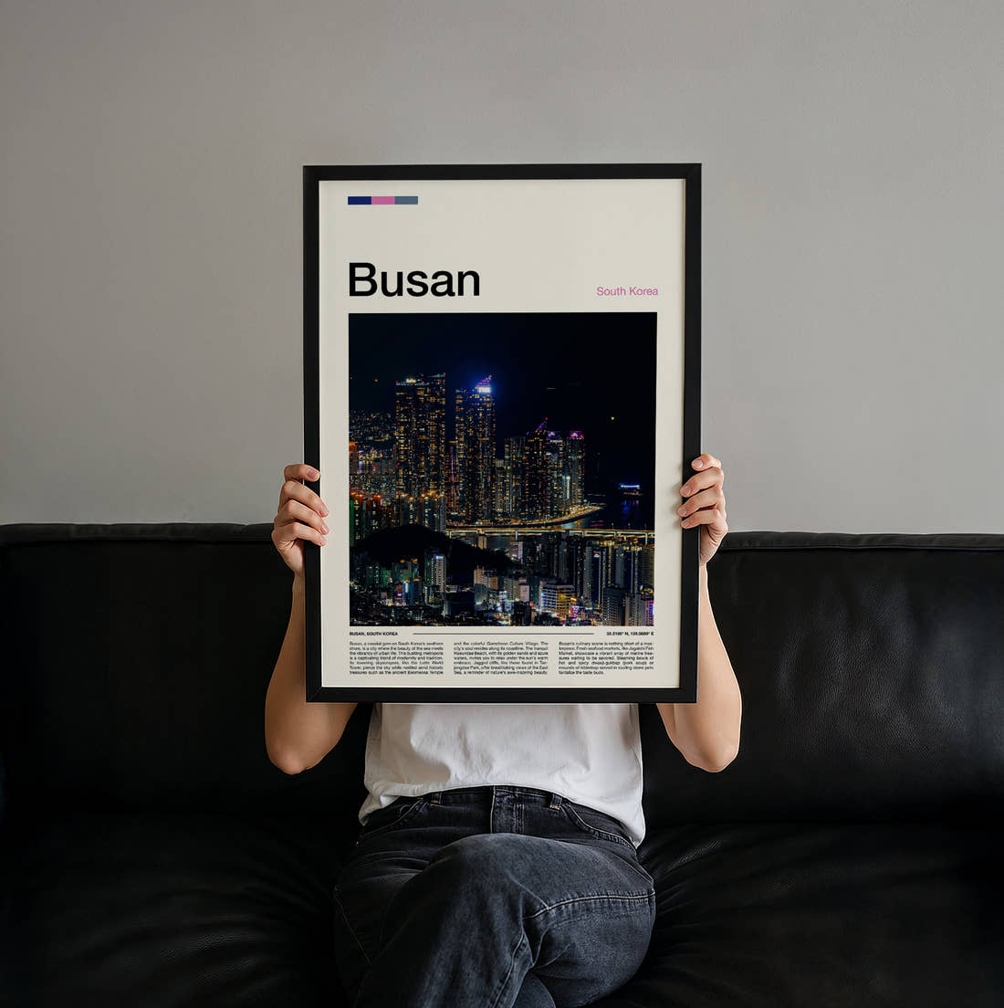 Busan Night Skyline Travel Print held up by hand to show the size of the print