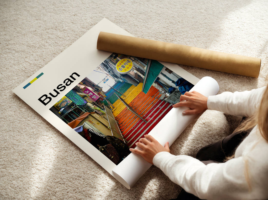 Busan Colourful Painted Steps Travel Print being unrolled from its postal tube