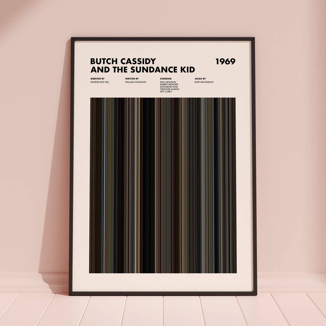 Butch Cassidy and the Sundance Kid Movie Barcode Poster framed and leaning against a coloured wall