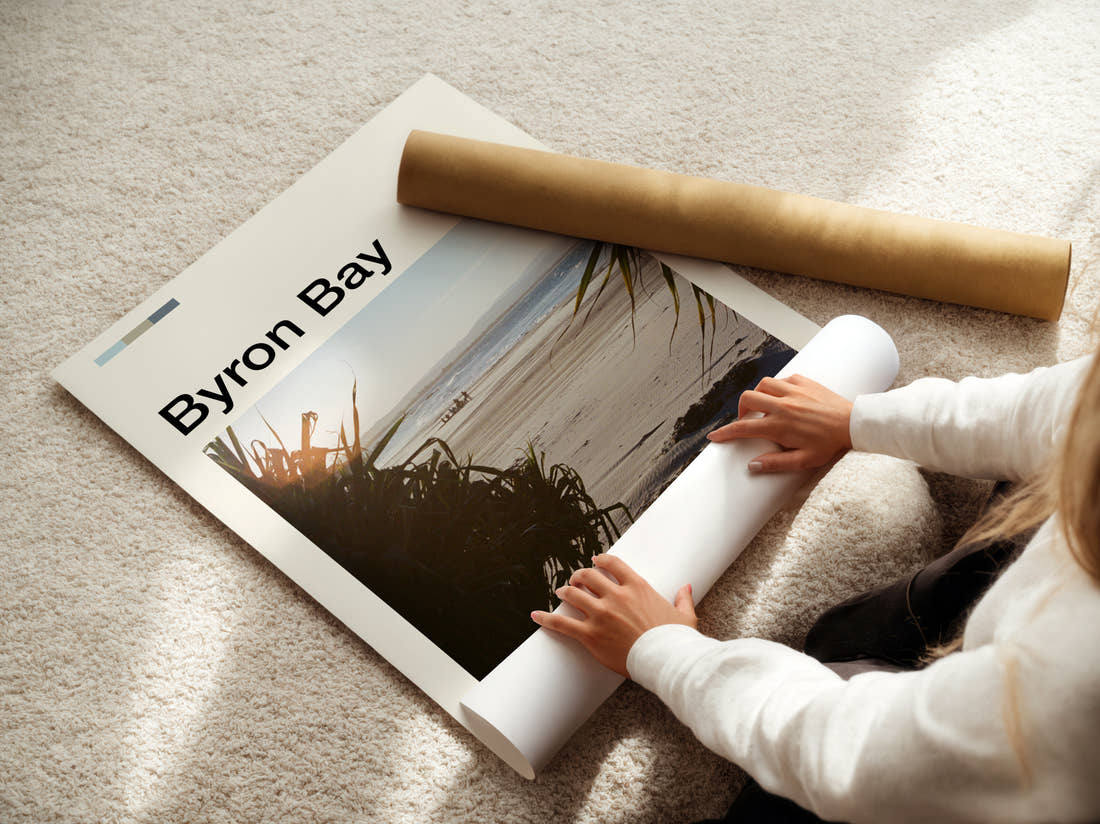 Byron Bay Beach Through Palm Leaves Travel Print being unrolled from its postal tube