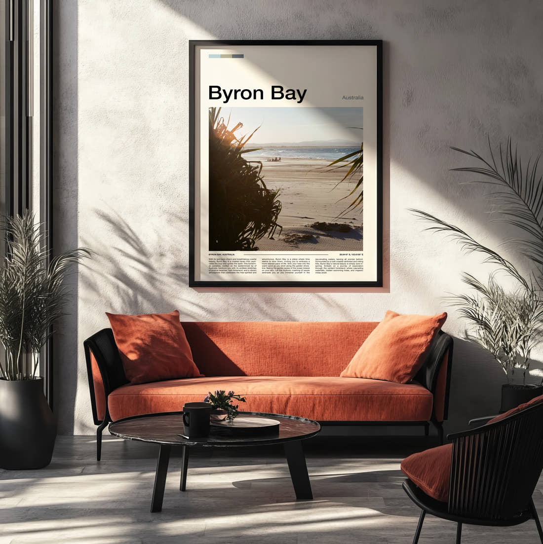 Byron Bay Beach Through Palm Leaves Travel Print framed on the wall of a modern living room