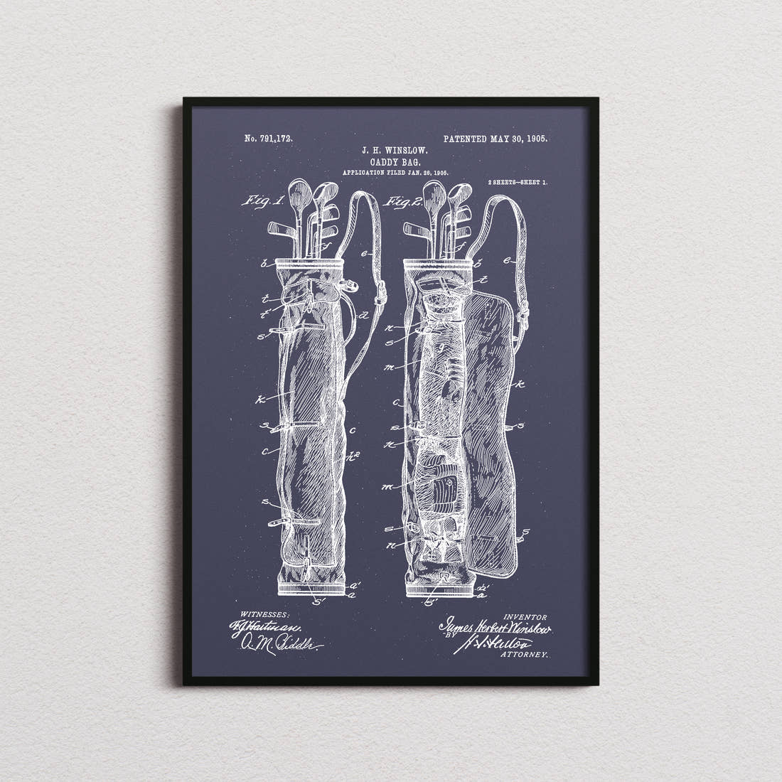 Caddy Bag Patent Print in the navy colourway, framed