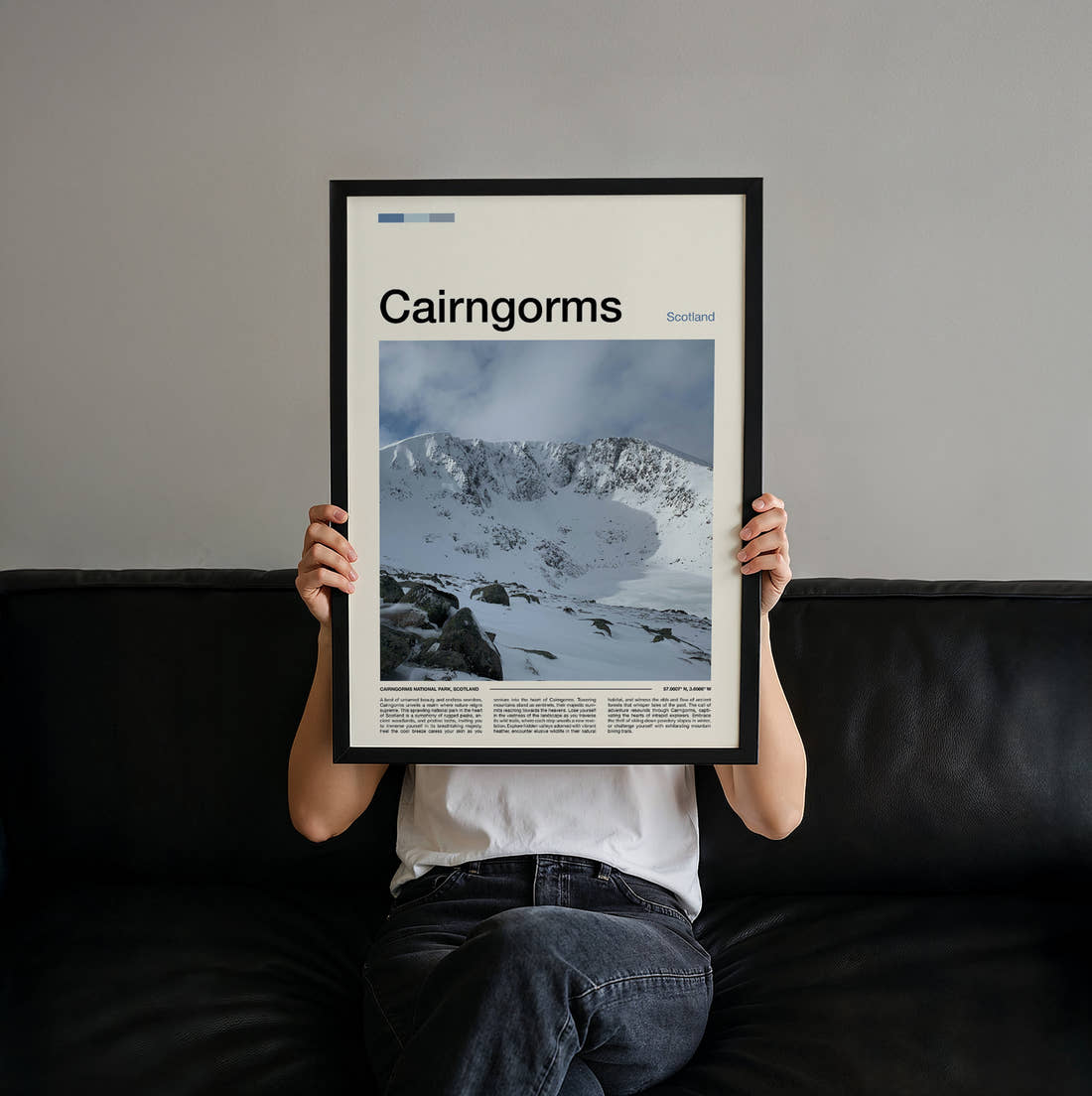 Cairngorms Snowy Mountains Travel Print held up by hand to show the size of the print