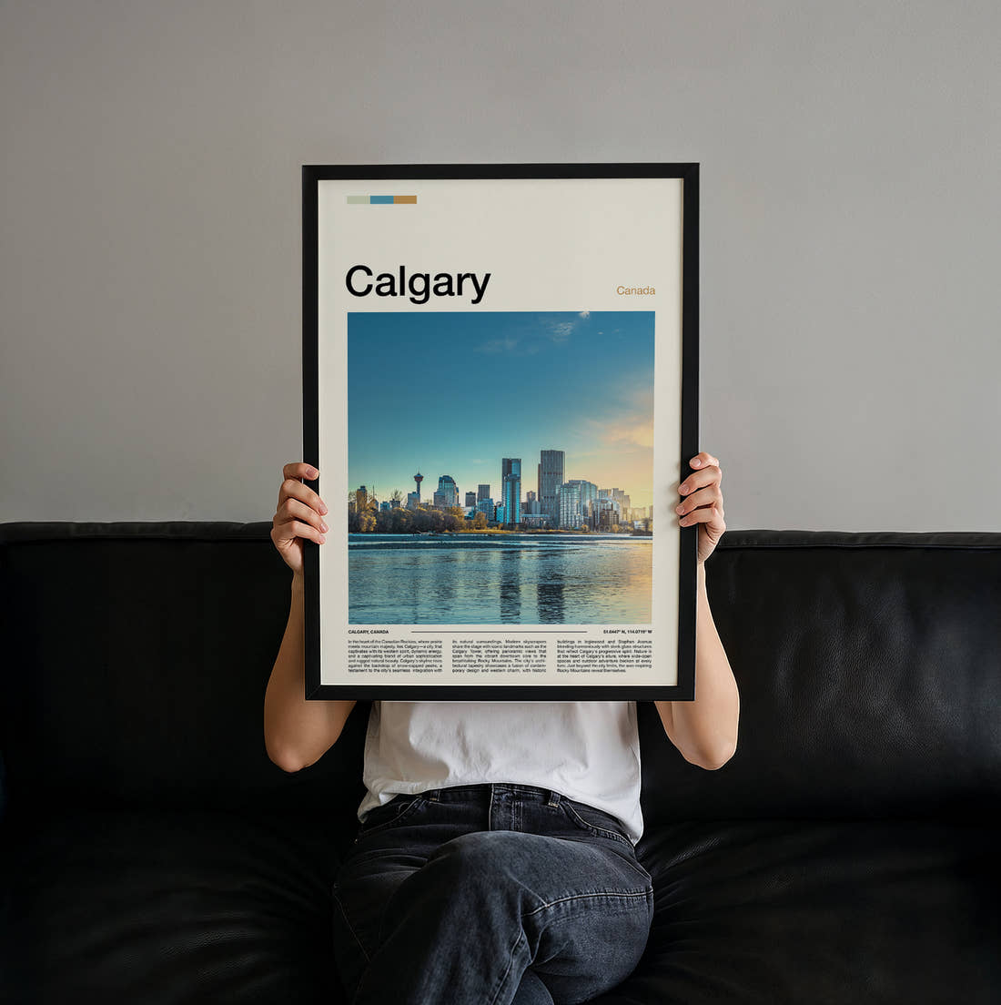 Calgary Skyline Across The River Travel Print held up by hand to show the size of the print