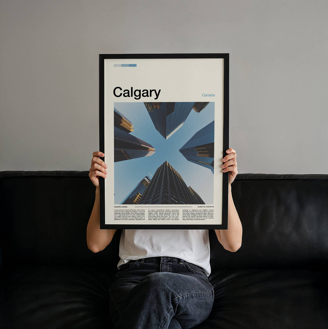 Calgary Skyscrapers From Below Travel Print held up by hand to show the size of the print