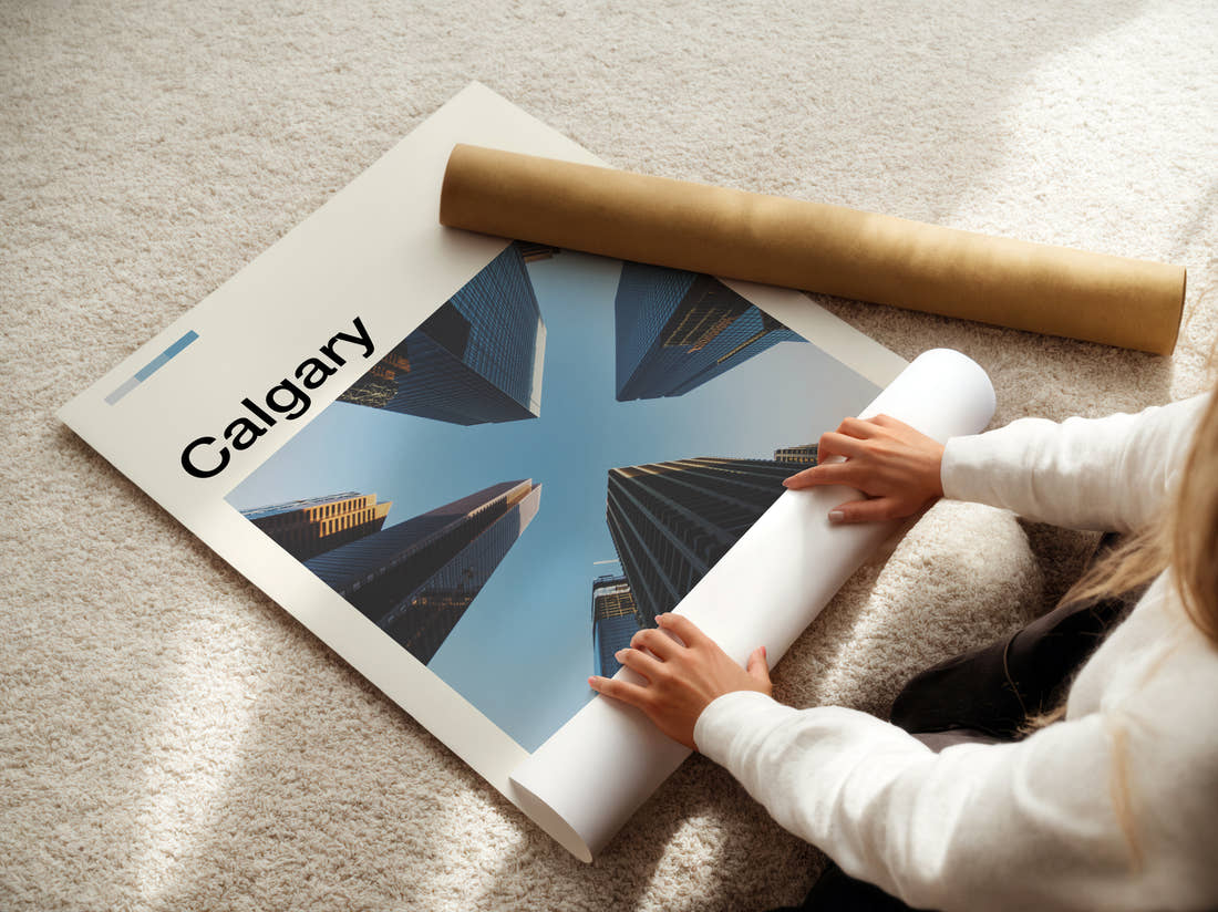 Calgary Skyscrapers From Below Travel Print being unrolled from its postal tube