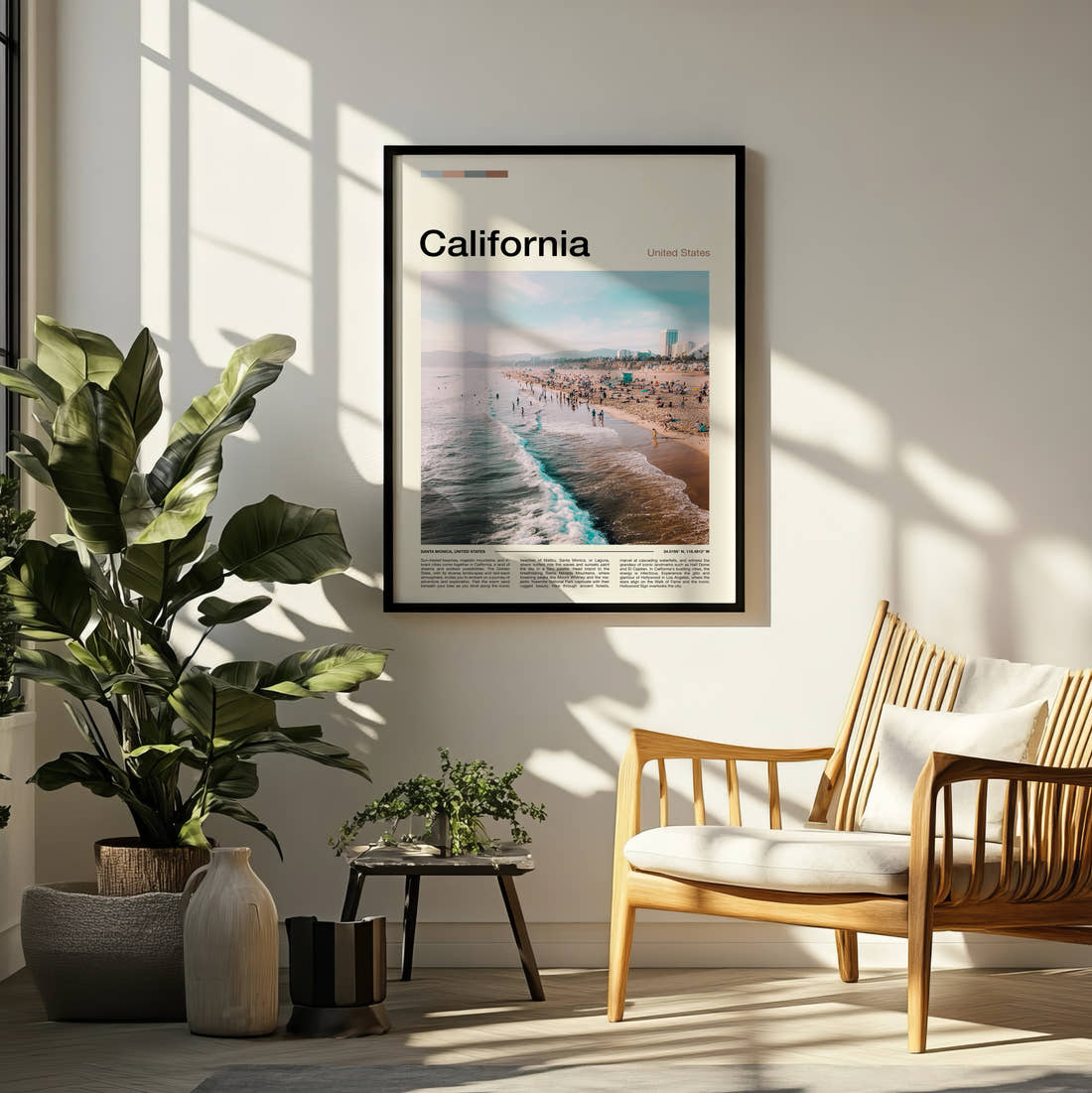 California Beach From Above Travel Print framed on a pale wall beside houseplants