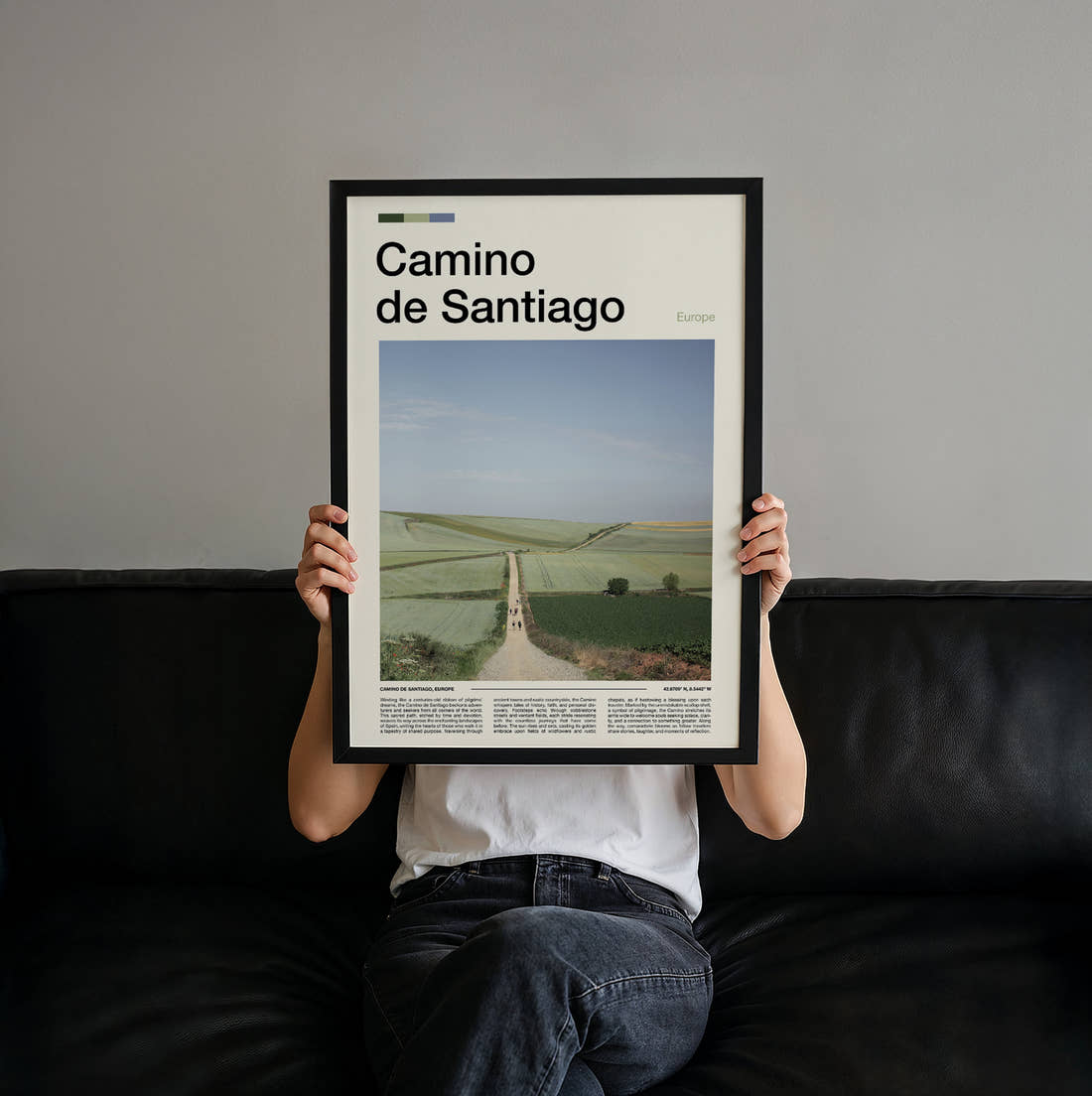 Camino De Santiago Path Through Fields Travel Print held up by hand to show the size of the print
