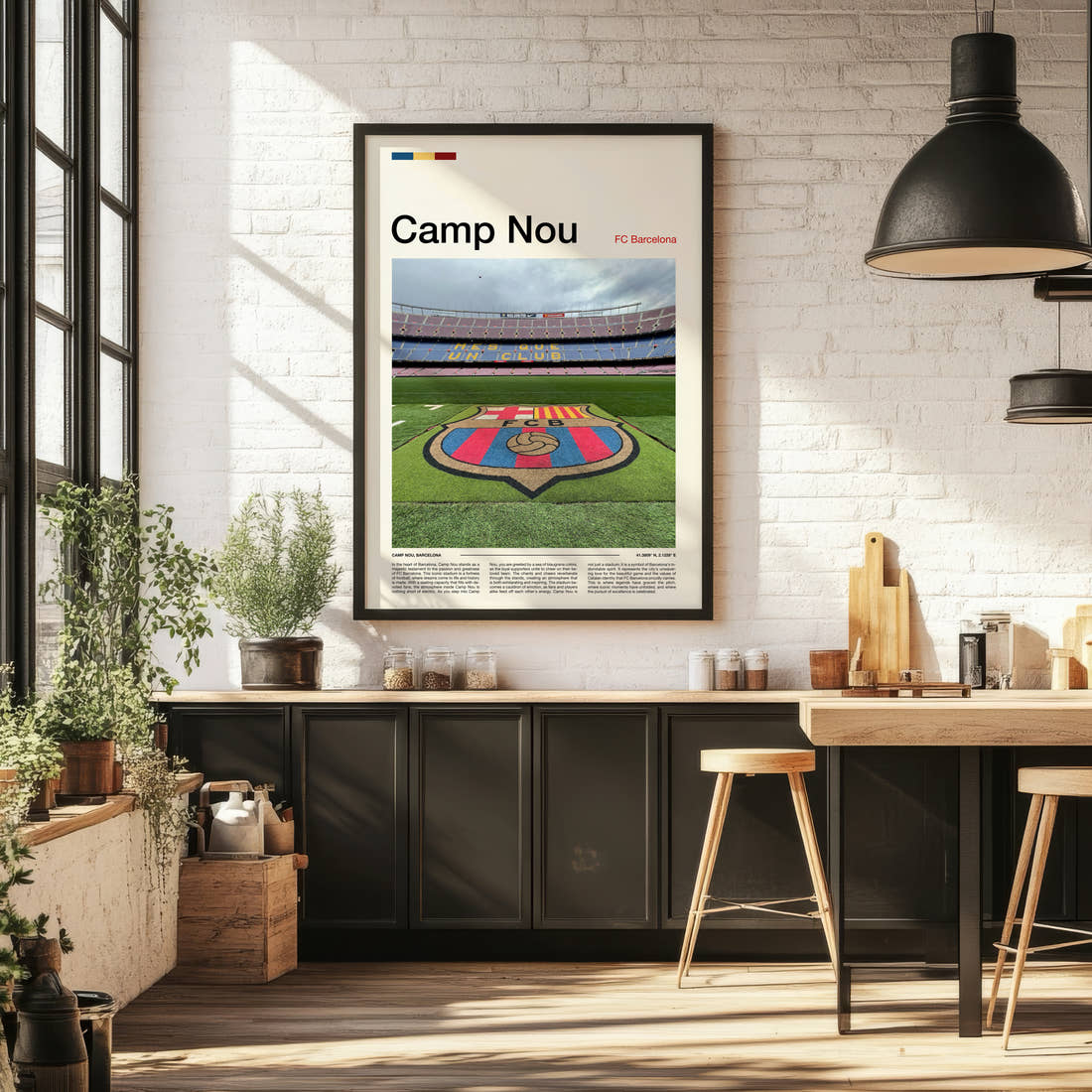Camp Nou Stadium Print framed on the wall of a bright kitchen and dining space