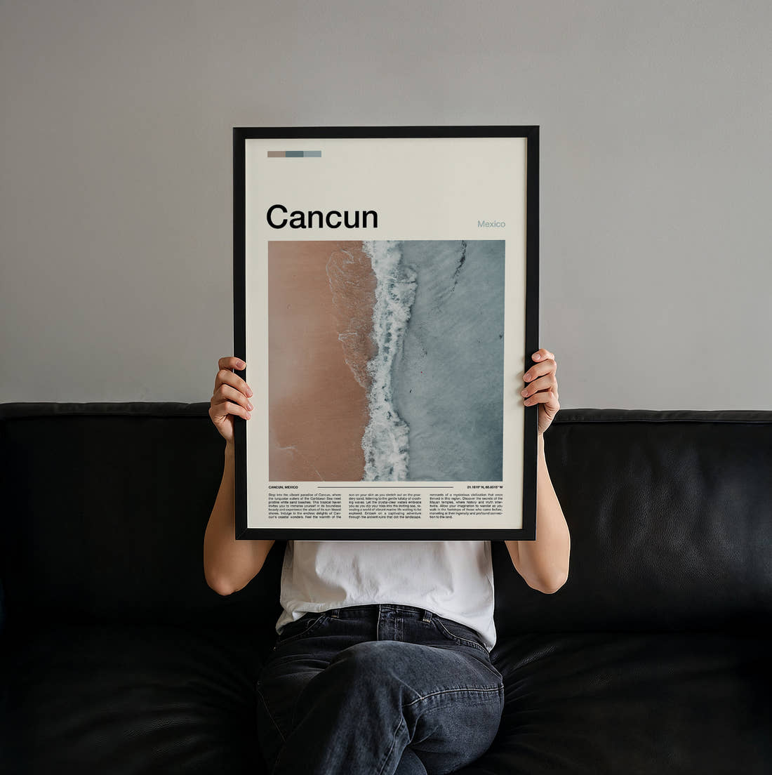 Cancun Aerial View Of Beach Travel Print held up by hand to show the size of the print