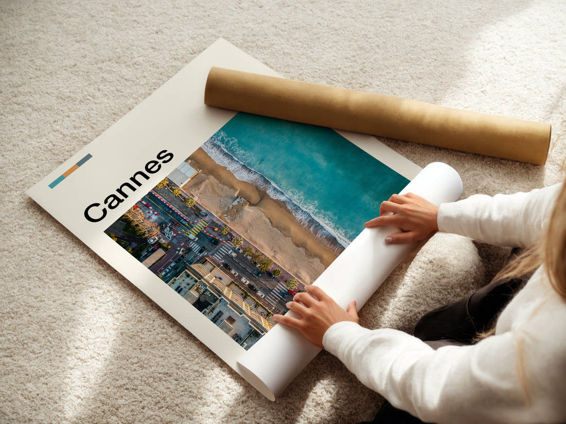 Cannes Aerial View Of Coastline Travel Print being unrolled from its postal tube