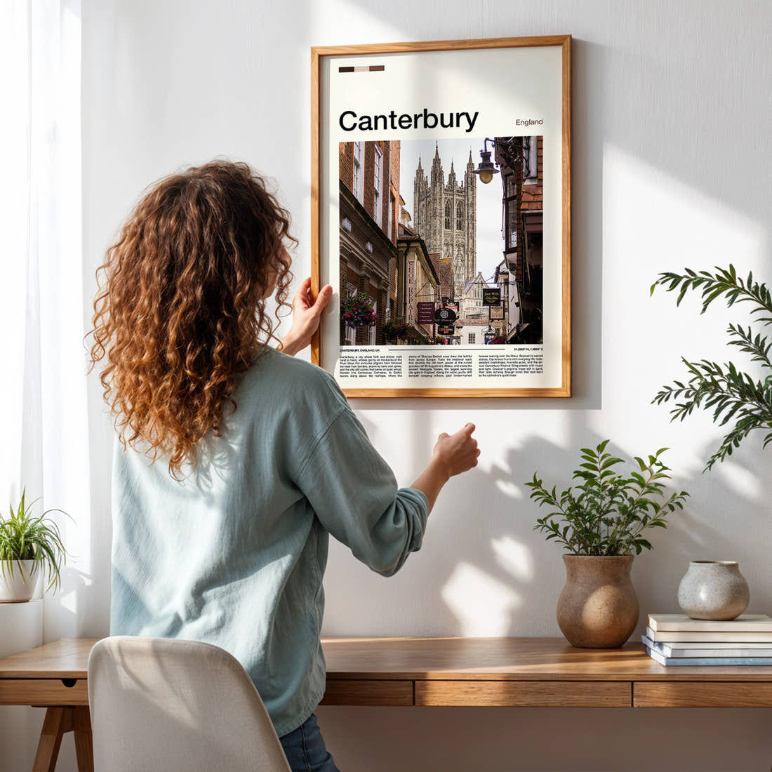 Canterbury Cathedral Street View Travel Print framed on a pale wall beside houseplants
