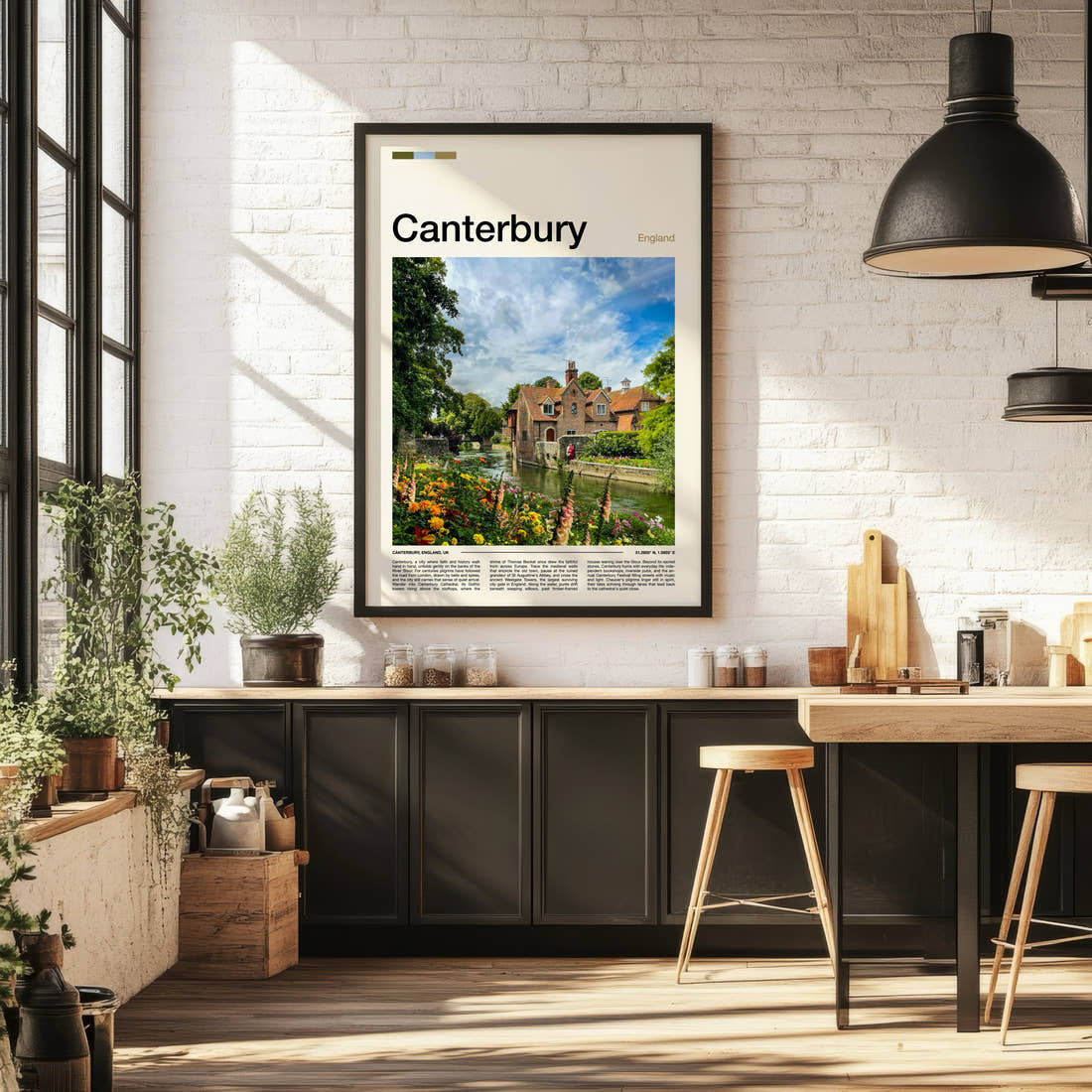Canterbury Riverside Cottages And Blooms Travel Print framed on the wall of a bright kitchen and dining space