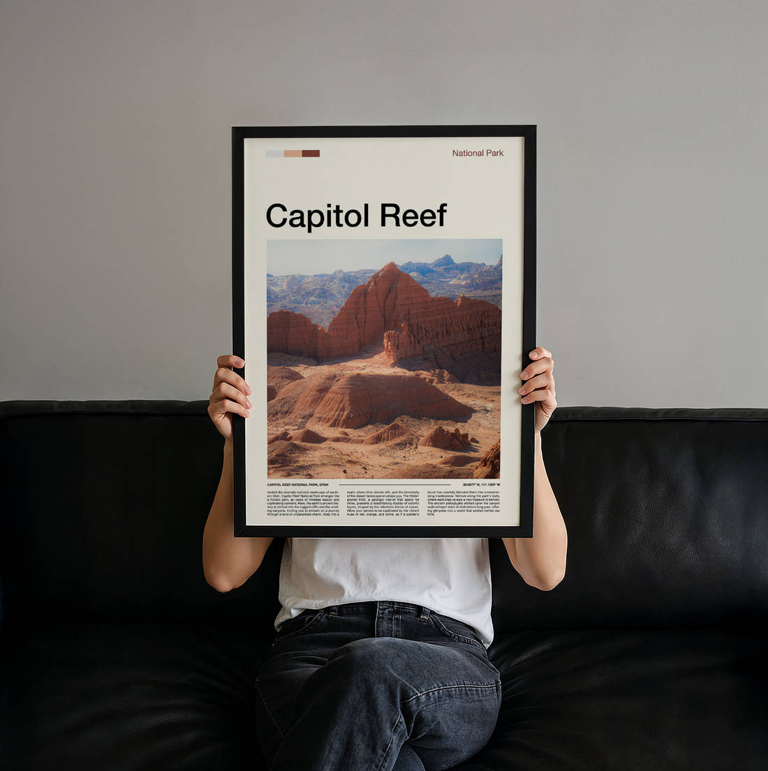 Capitol Reef Eroded Red Cliffs Travel Print held up by hand to show the size of the print