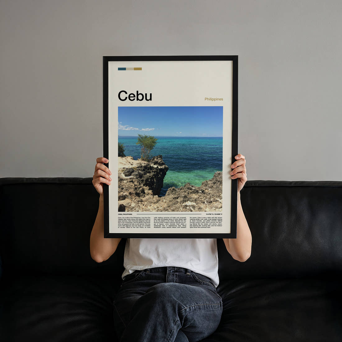 Cebu Rocky Coastal Cliff Travel Print held up by hand to show the size of the print
