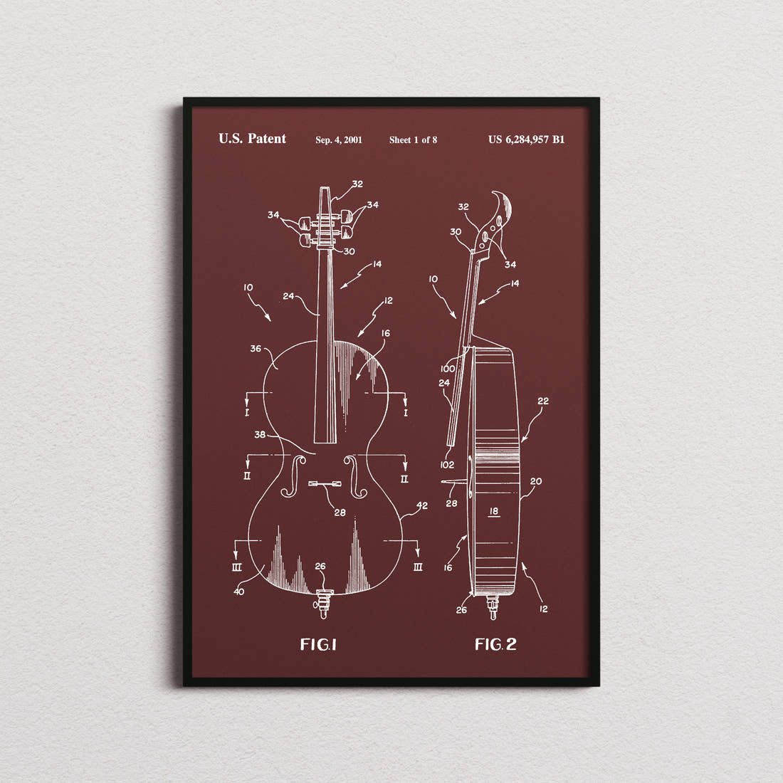 Cello Patent Print in the burgundy colourway, framed