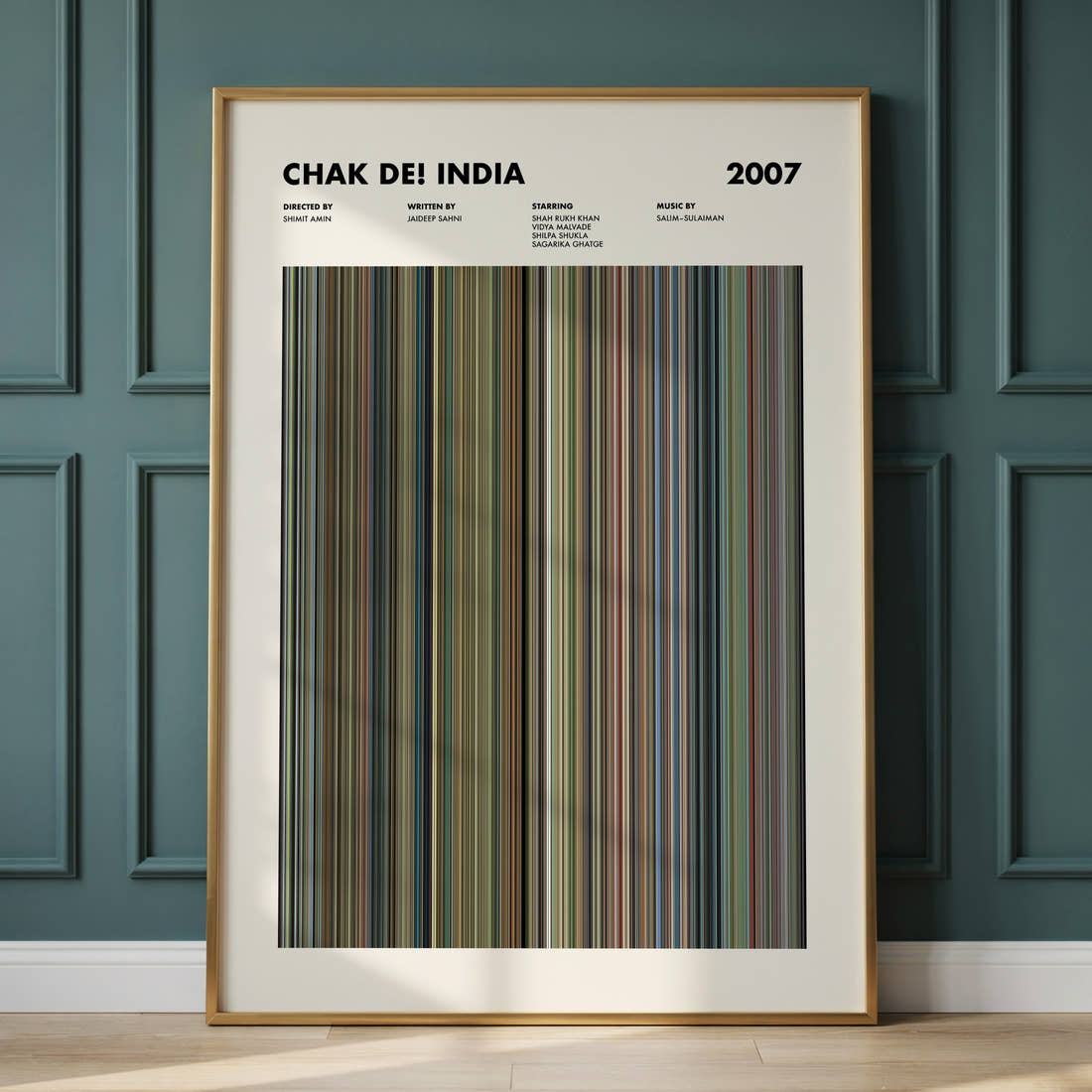 Chak De! India Movie Barcode Poster framed and leaning against a panelled wall