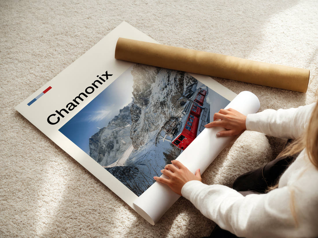 Chamonix Red Mountain Train Travel Print being unrolled from its postal tube