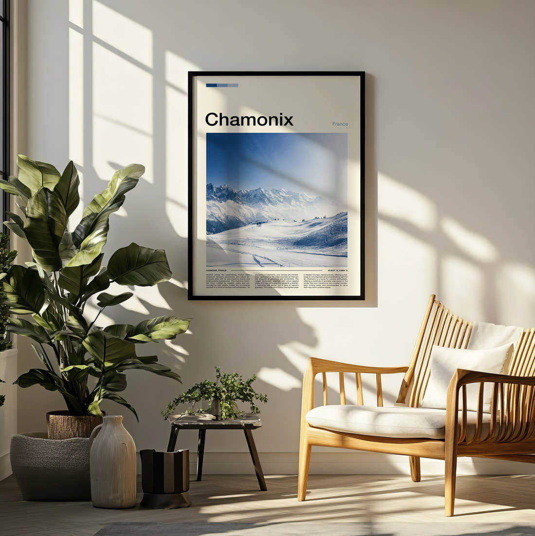 Chamonix Snowy Ski Slopes Travel Print framed on a pale wall beside houseplants