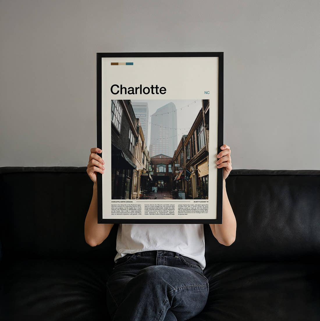 Charlotte Narrow Alley Travel Print held up by hand to show the size of the print