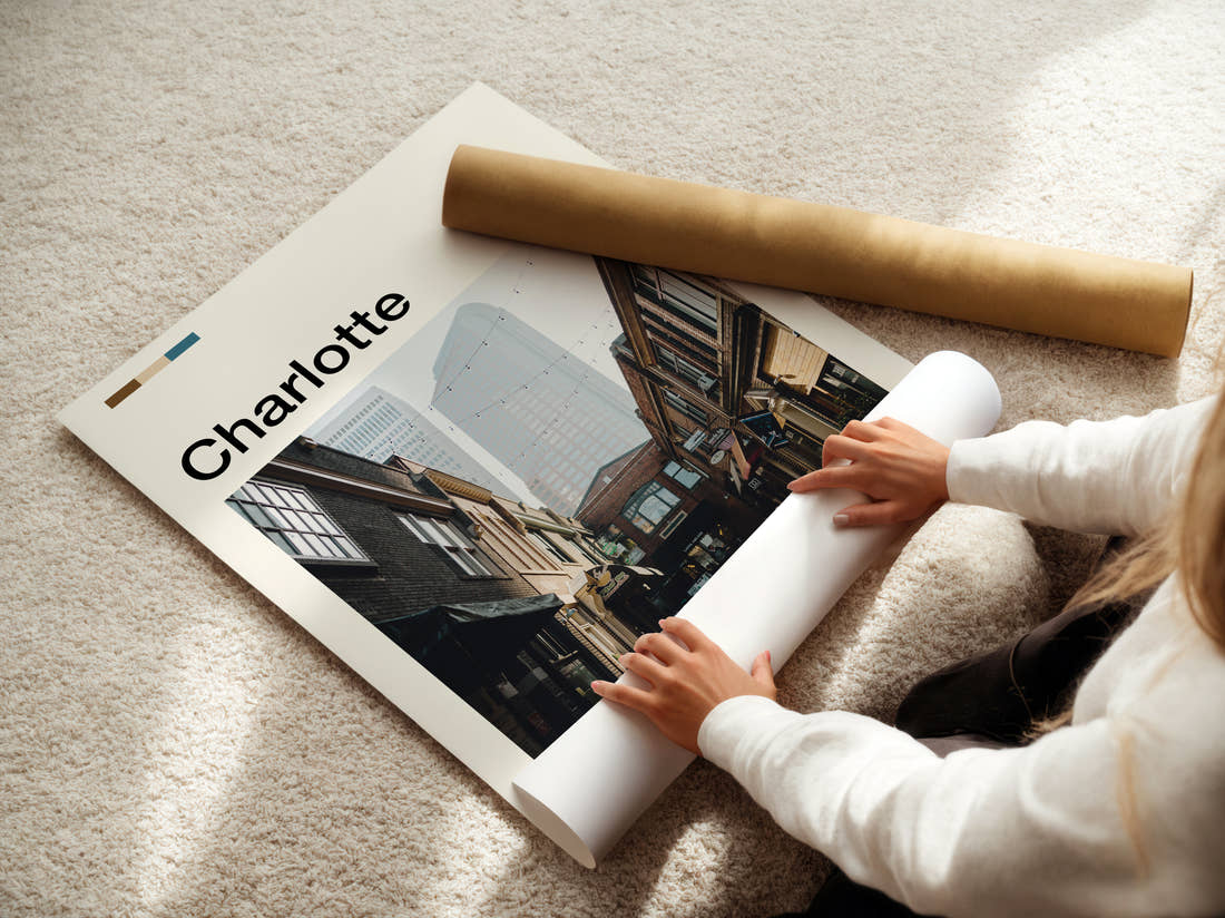 Charlotte Narrow Alley Travel Print being unrolled from its postal tube