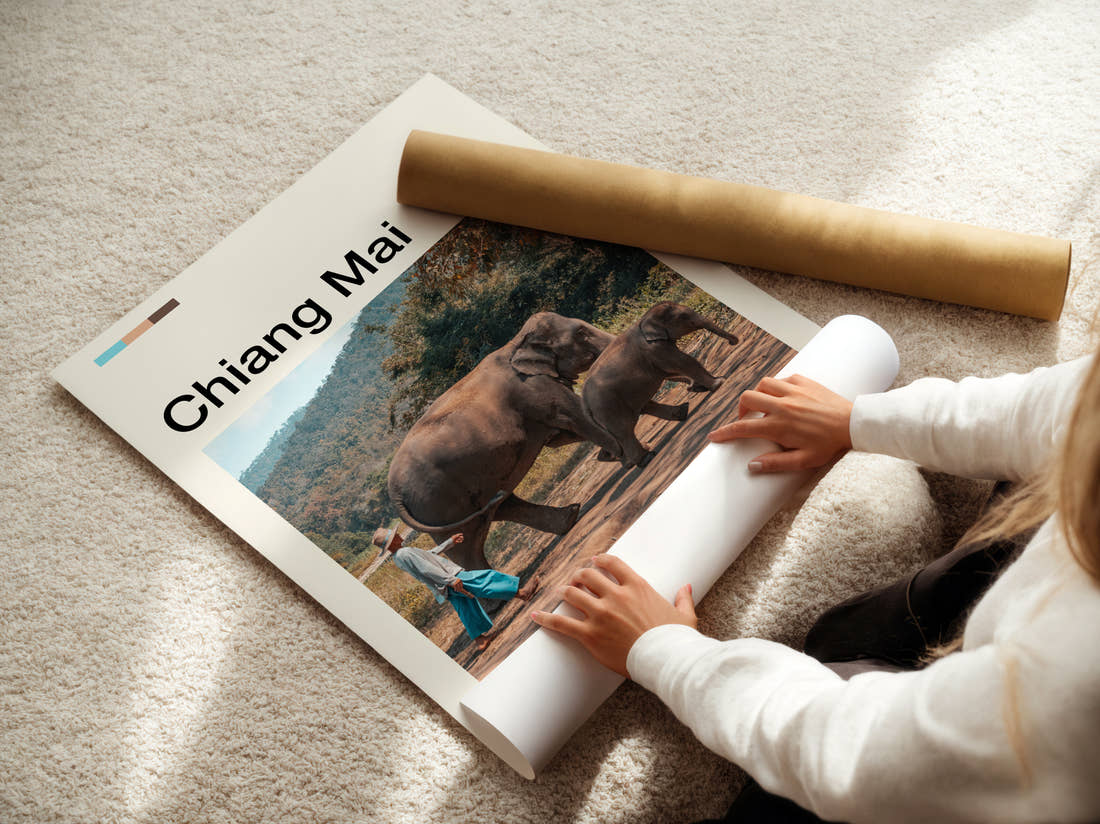 Chiang Mai Elephants Travel Print being unrolled from its postal tube