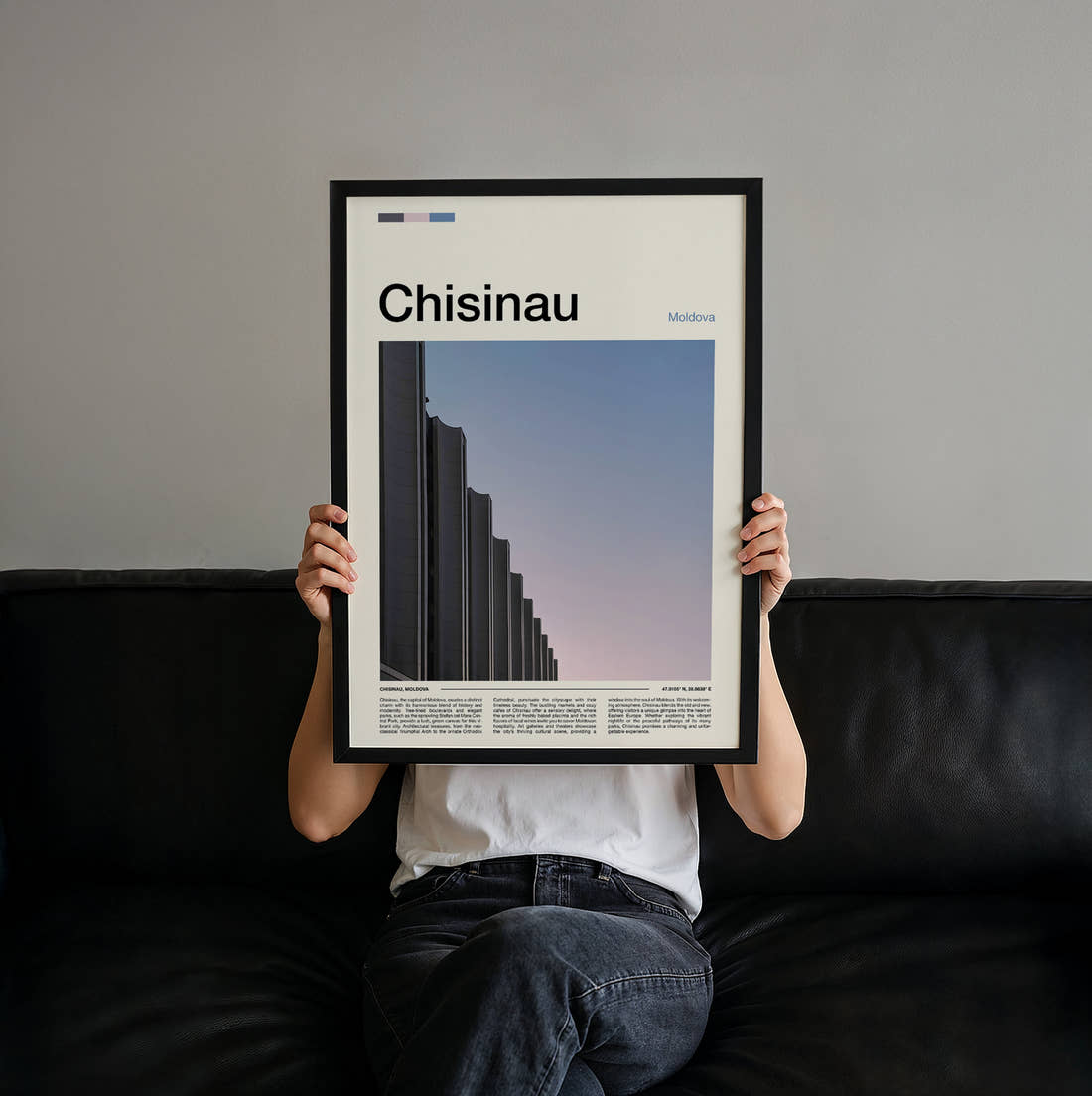 Chisinau Brutalist Building Travel Print held up by hand to show the size of the print