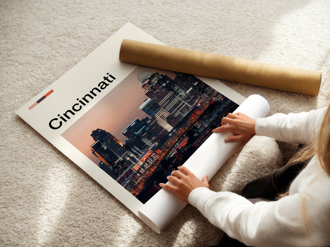 Cincinnati Skyline At Dusk Travel Print being unrolled from its postal tube