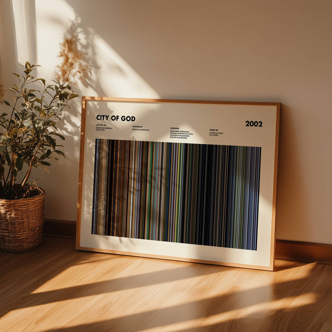 City Of God Movie Barcode Poster framed and leaning against a wall on a wooden floor