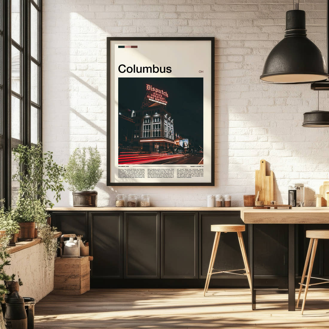 Columbus Illuminated Dispatch Building Travel Print framed on the wall of a bright kitchen and dining space