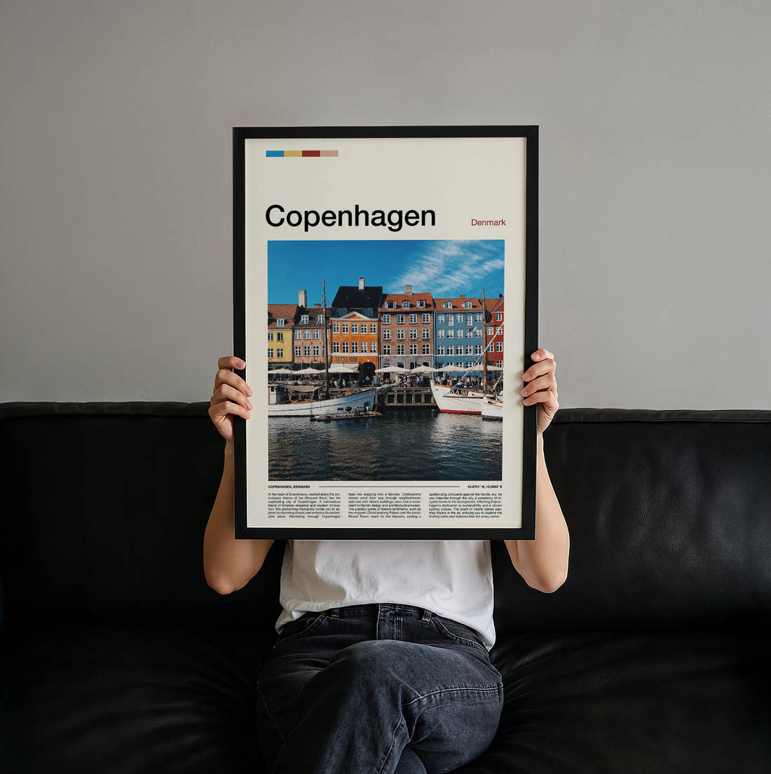 Copenhagen Nyhavn Colourful Facades Travel Print held up by hand to show the size of the print
