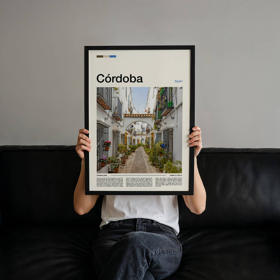 Córdoba Flower-Filled Alleyway Travel Print held up by hand to show the size of the print