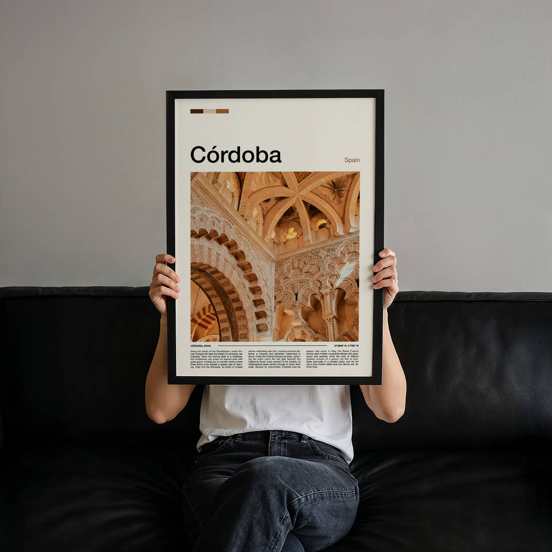 Córdoba Ornate Mezquita Arches Travel Print held up by hand to show the size of the print