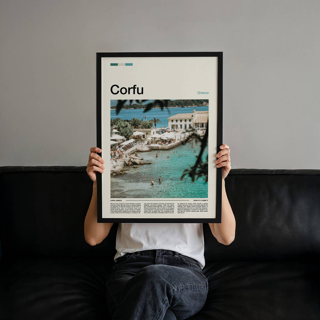 Corfu Turquoise Harbour Cove Travel Print held up by hand to show the size of the print